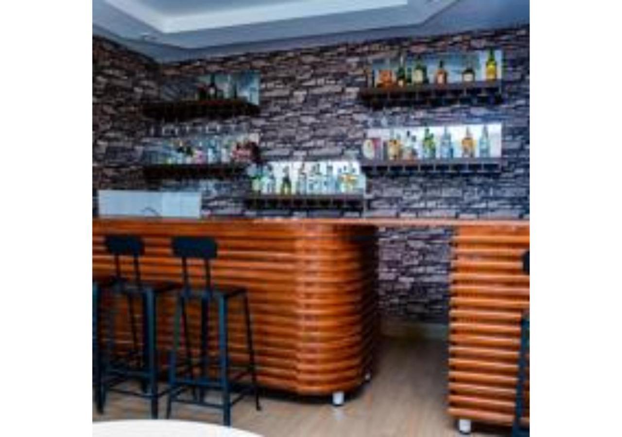 Centric Hotel Кигали Екстериор снимка